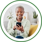 A woman uses her smartphone to browse insurance coverages online. 
